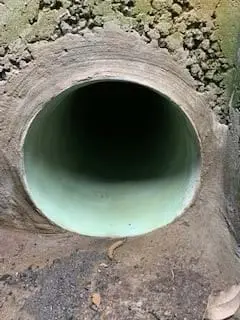 The smooth end of a relined pipe after curing